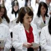 International Physician Scholarship in USA, 2017 Thomas Jefferson University's Jefferson Medical College first-year students from left, Emily K. Fay, Jessica M. Torres, and Rino Sato take the Hippocratic Oath during the annual White Coat Ceremony, Friday, Aug. 5, 2011, in Philadelphia. The ceremony symbolizes the clinical beginning of the students' medical educations. (AP Photo/Matt Rourke)